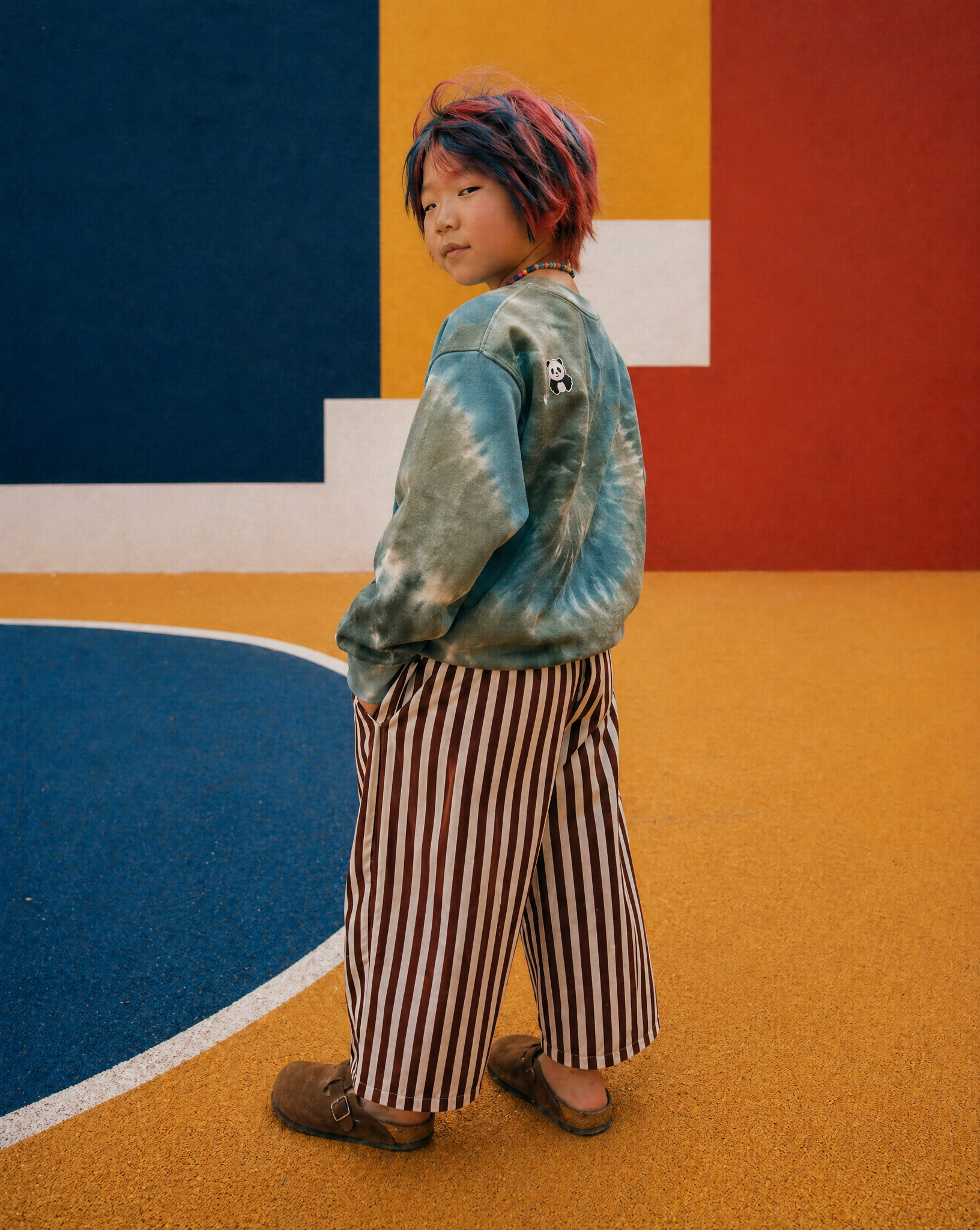 Tie dye sweater with printed stickers